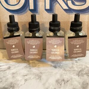 Four Bath & Body Works Vanilla Coconut Wallflowers Refills